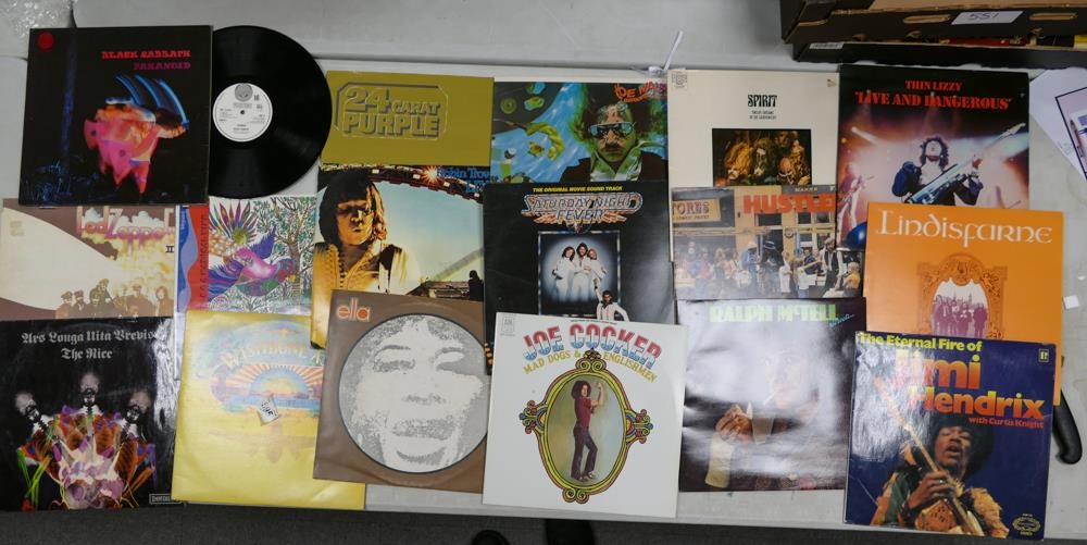 A collection of 1970's & later Vinyl Lp's including Black Sabbath Paranoid, 24 Carat Purple, Joe