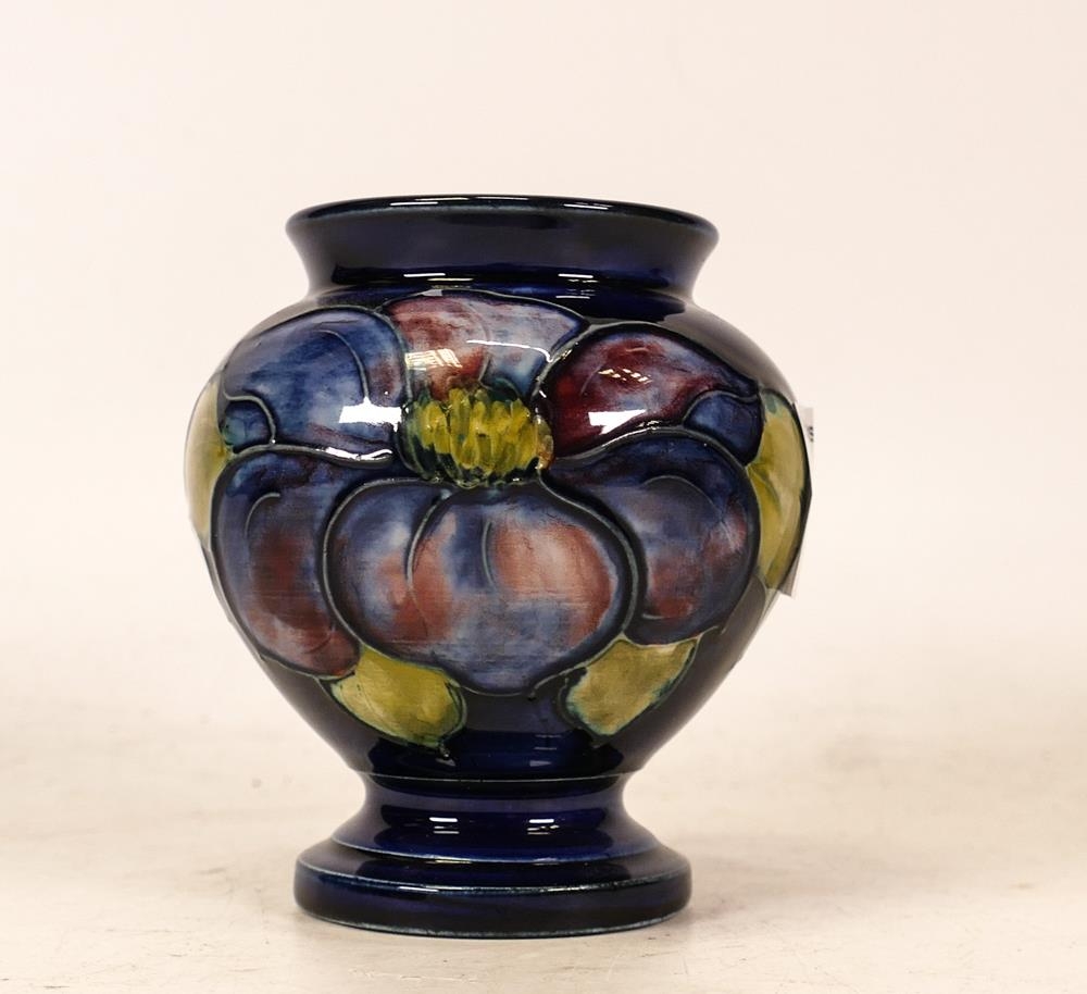 Moorcroft Footed Squat Vase in the Anemone Pattern on Blue Ground. Queen Mary Sticker to Base.