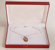 9ct rose gold pendant & necklace, the pendant set with oval purple stone, 4.7g.