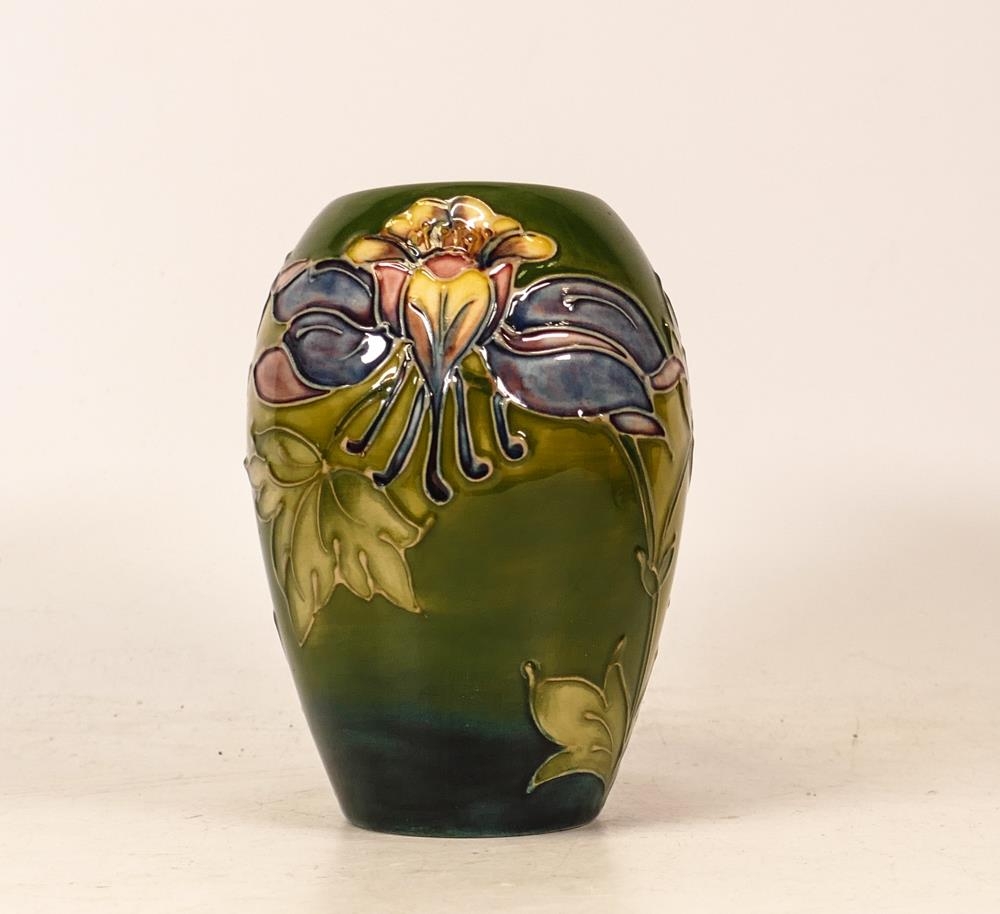 Moorcroft Ovoid Vase in the Columbine Pattern on Green Ground. Height: 13cm