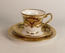 De Lamerie Fine Bone China heavily gilded Burgundy Majestic Pattern Trio, specially made high end