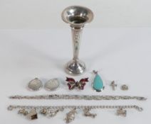 Assortment of silver jewellery including charm bracelet, lockets, silver & enamel bow brooch etc., &