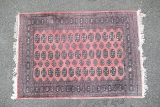 Oriental rug /carpet, believed of Persian origin, measures 180cm x 128cm appx., excl. fringes.