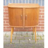 WK Möbel Mid-Century tambour Fronted Record Cabinet on Metal Fitted Castor Feet. Height: Length: