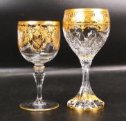 Two De Lamerie Fine Bone China heavily gilded Non Matching Wine Glasses, specially made high end