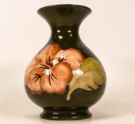 Moorcroft Squat Vase in the Hibiscus Pattern on Green Ground. Height: 13cm