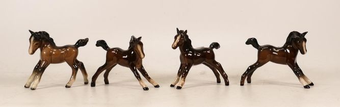 Four Beswick Foals including 815 and 997 (some damages notes) (4)