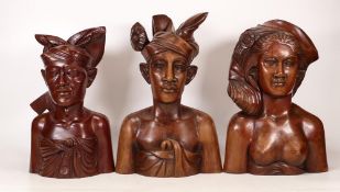 Three Carved Wooden Busts depicting the Igorot People of the Phillipines. Slight chip to top of