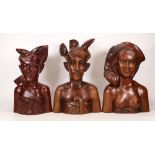 Three Carved Wooden Busts depicting the Igorot People of the Phillipines. Slight chip to top of
