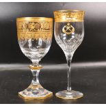 Two De Lamerie Fine Bone China heavily gilded Non Matching Wine Glasses with Saudi Arabia Crest ,