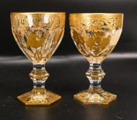 Two De Lamerie Fine Bone China heavily gilded Non Matching Wine Glasses with Arabic Motif, specially