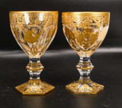 Two De Lamerie Fine Bone China heavily gilded Non Matching Wine Glasses with Arabic Motif, specially