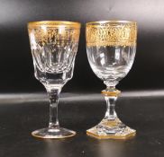 Two De Lamerie Fine Bone China heavily gilded Non Matching Wine Glasses, specially made high end