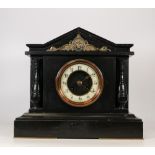 Victorian Slate Mantle Clock with Enamel Dial and Medusa Frieze Pediment. Crack to enamel dial. (not