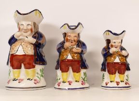 Three Graduated Allertons Snuff Taker Toby Jugs with Copper Lustre Decoration. Crack to back of
