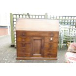 Distressed Late 19th/ Early 20th Century Drop Front Bureau with One Long Drawer over Eight smaller