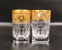 Two De Lamerie Fine Bone China heavily gilded Non Matching Glasses with Saudi Arabia Crest ,