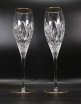 two Atlantis Cut Glass Crystal Champagne Flutes with gold rims, height 16.5cm
