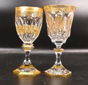 Two De Lamerie Fine Bone China heavily gilded Non Matching Wine Glasses, specially made high end