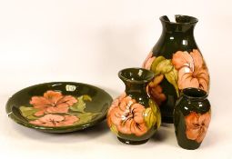 Moorcroft Hibiscus shallow bowl and three vases . Tallest and smallest vase damaged (4)