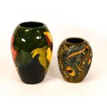 Moorcroft Hibiscus vase together with Peacock feather vase ( chip to top rim). Height of tallest
