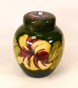 Moorcroft Hibiscus large ginger jar on green background. Height 20cm. lid stuck down