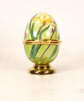 Moorcroft enamel egg decorated with daffodil and pussy willow by Fiona Bakewell . Boxed . height 6cm