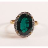 Lab Grown Emerald & Diamond Halo Ring 4.68ct in 375 9ct Gold - Featuring an exquisite oval cut,