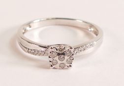 9ct White Gold Cross Over Diamond Ring This very special setting assures you of a great dazzle