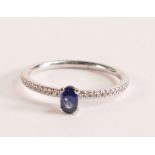 18ct White Gold Ring With Sapphire and Diamond - This elegant ring features a stunning deep blue