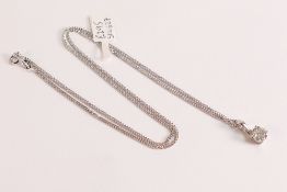 9ct White Gold Diamond Pendent on a 9ct 20 inch Chain This beautiful 9ct white Gold pendent hosts