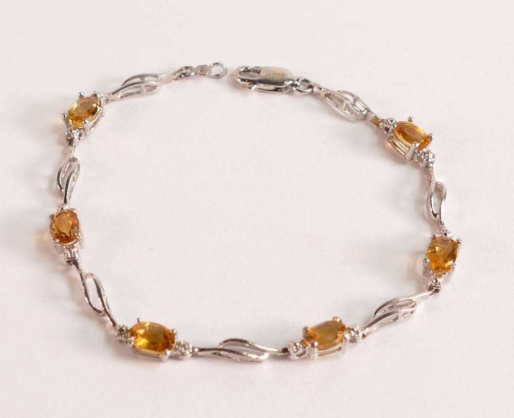 Citrine & Diamond Classic Tennis Bracelet in 9ct White Gold - seven citrines, grade AAA, total 3.