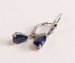 9ct White Gold Sapphire and Diamond Earrings - The tear drop deep blue Sapphire measures 9.5mm by