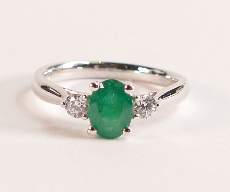 1.00ct Emerald and Diamond Platinum Ring - The oval cut Emerald measures approx 7mm by 5mm, the