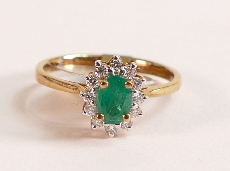 9ct Gold Ring with Emerald and Diamond Halo - The head of the ring measures in total 10.24mm x 8.