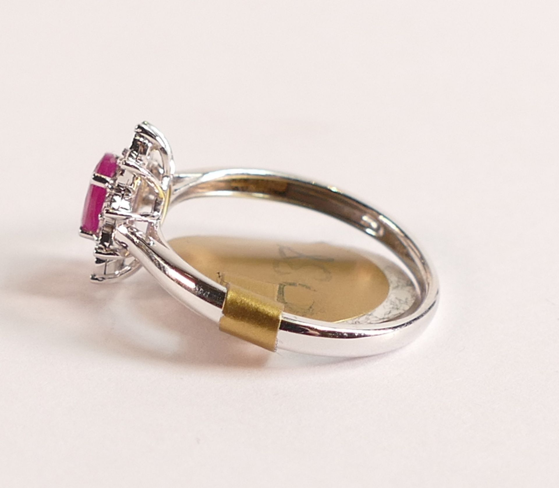 9ct White Gold Ruby and Diamond Halo Ring - The head of the ring measures in total 10.24mm x 8. - Image 2 of 3