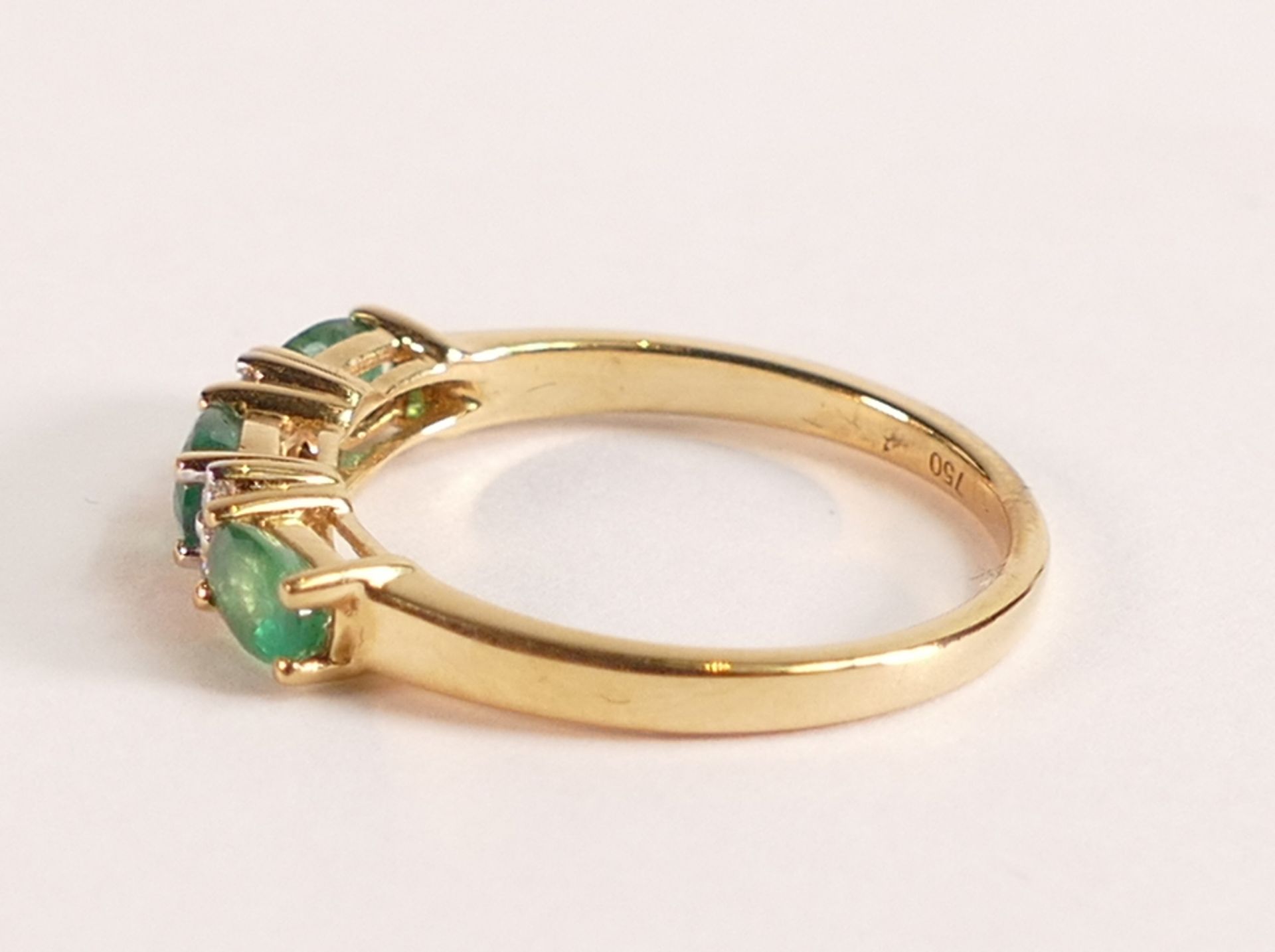 18ct Gold Ring with Marquise cut Emerald and Diamond The 18ct Gold band is stamped 750 and 18K. - Image 2 of 3