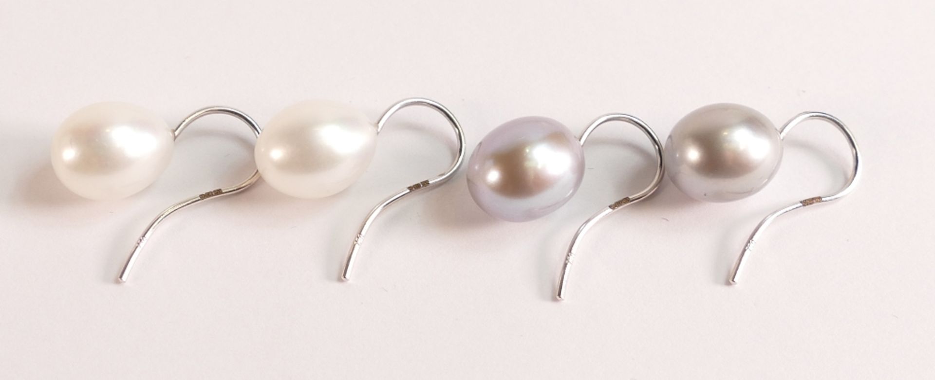 Two pairs of 18ct white gold pearl earrings -18ct white gold earrings are hallmarked 750