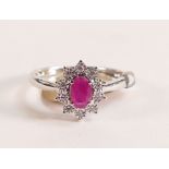 9ct White Gold Ruby and Diamond Halo Ring - The head of the ring measures in total 10.24mm x 8.