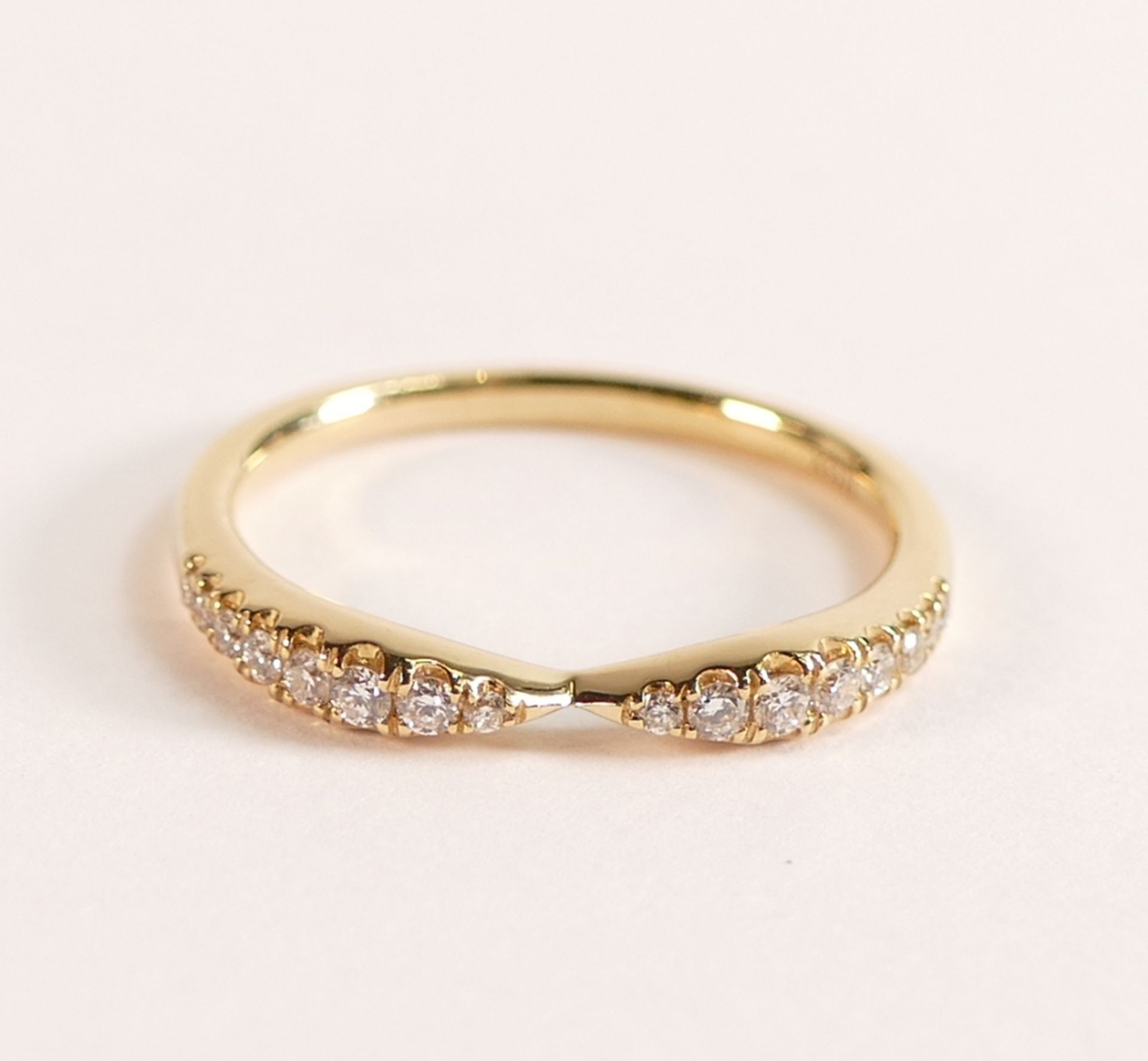 ROX 18ct Yellow Gold Diamond Bow Stacking Ring, approx carat weight is 0.20ct, size M, weight 2.4g.