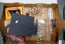 A mixed collection of items to include binoculars, telephone, three glass ship in a bottle,