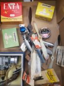 A collection of model airplane engines, propellers and accessories