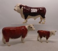 Beswick Hereford cattle family to include Polled Bull, cow and calf (3)