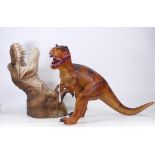 Resin t-rex wall plaque together with plastic t-rex figure, height of tallest 37cm