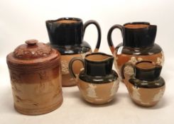 A Collection of Five Stoneware Items to include Lidded Tobacco Pot and Four Doulton Lambeth Jugs