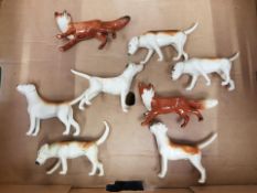 A group of 6 Beswick foxhounds and 2 standing small Foxes (8)