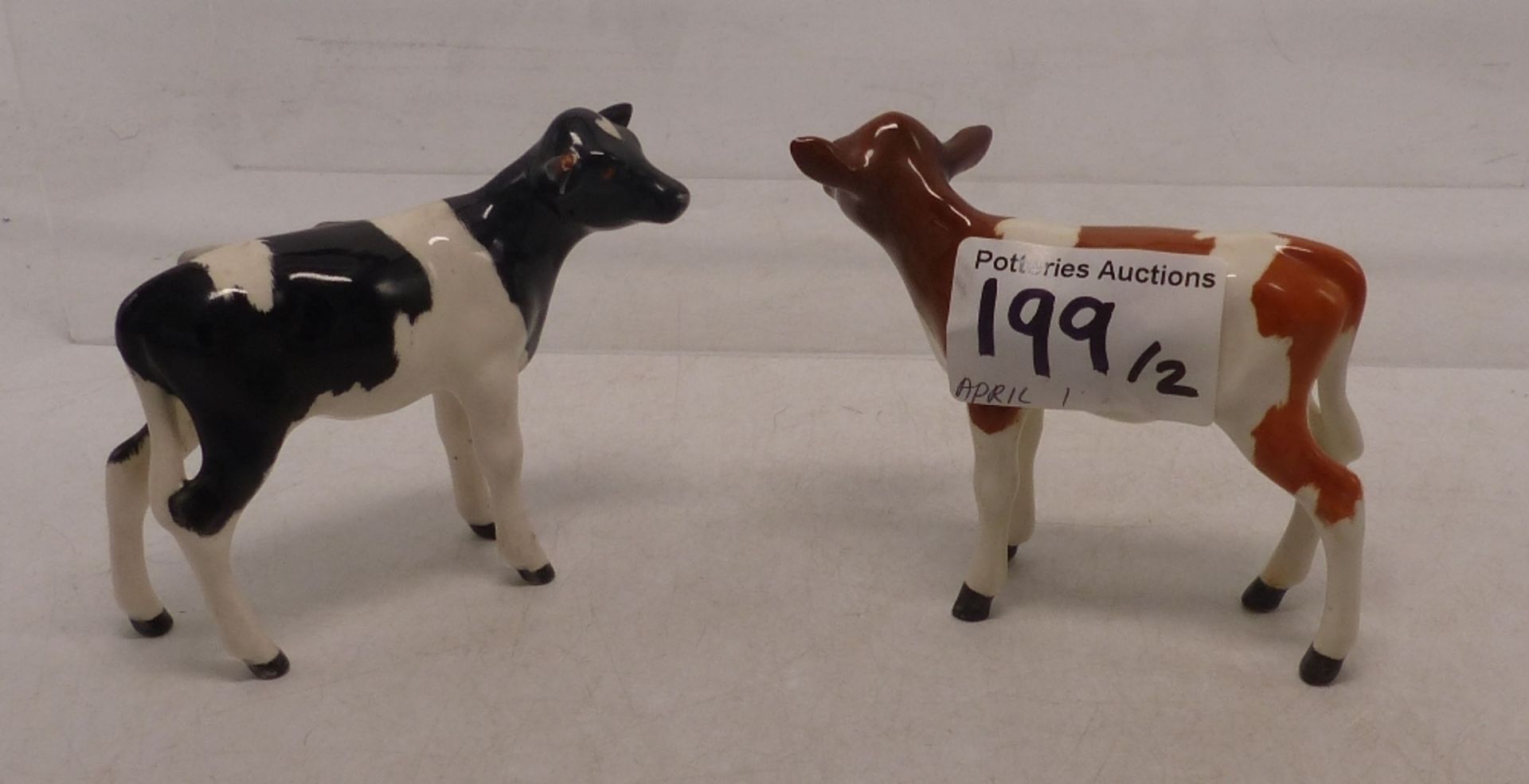 2 Beswick calfs comprising of Ayshire and Fresian examples (2)