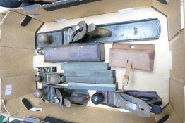 A collection of Stanley Wood Planes ranging from 56cm length to 10cm along with a miniature