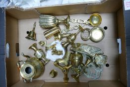 A collection of Brass Ornaments, Bells, Candlesticks & similar