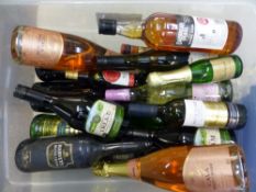 A large collection of sealed & unsealed bottles of Cava, wines, sherry, Highland Cream etc (1 tray).